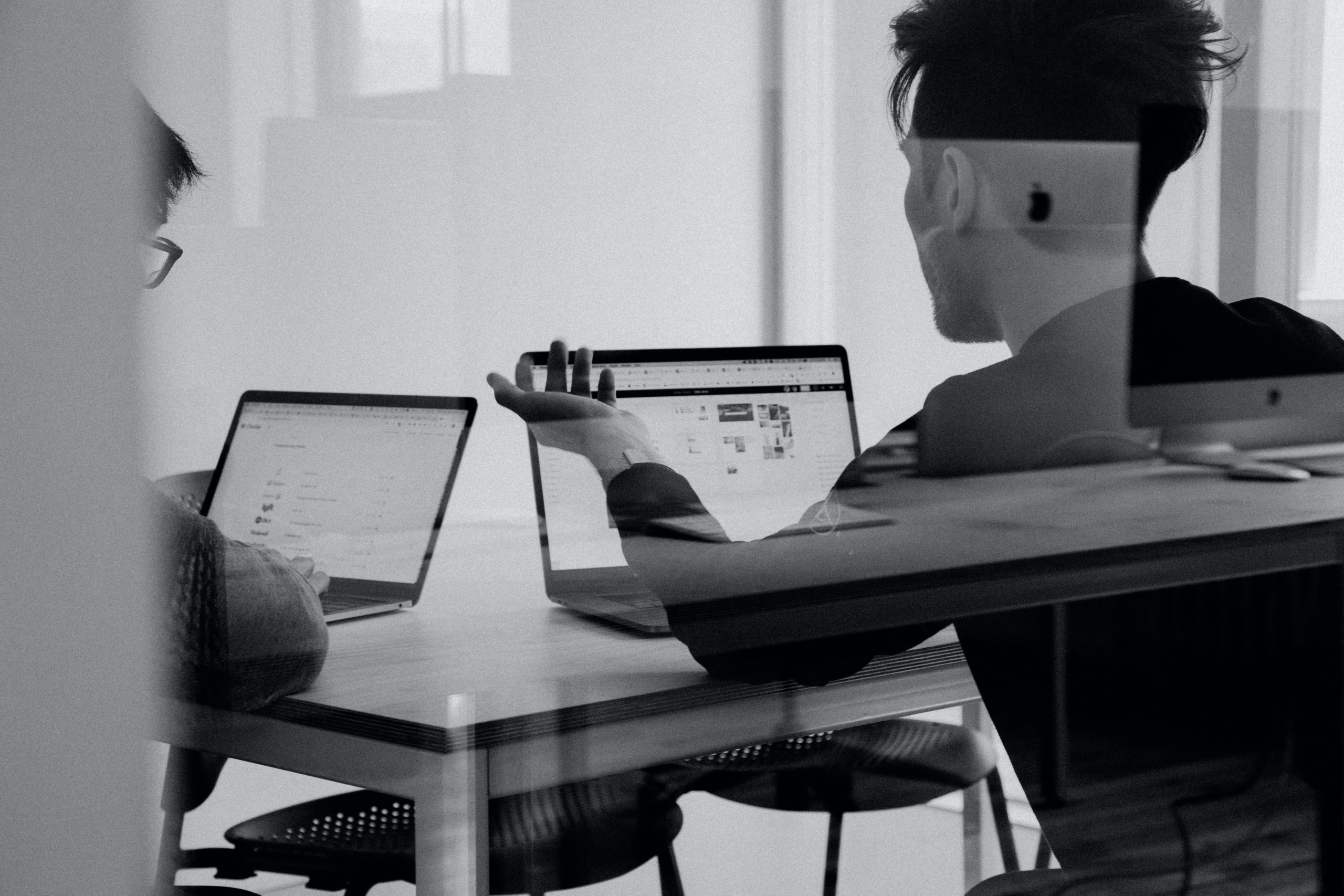 Two people engaging in feedback